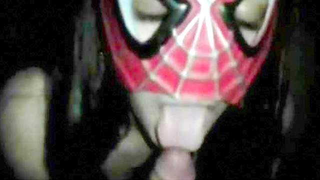 Spicy babe gives a blowjob in the spiderman mask