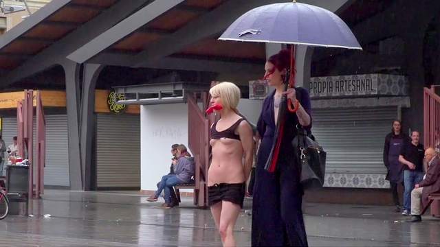 Kinky Silvia Rubi humiliates exposed sub Nora Barcelona in public