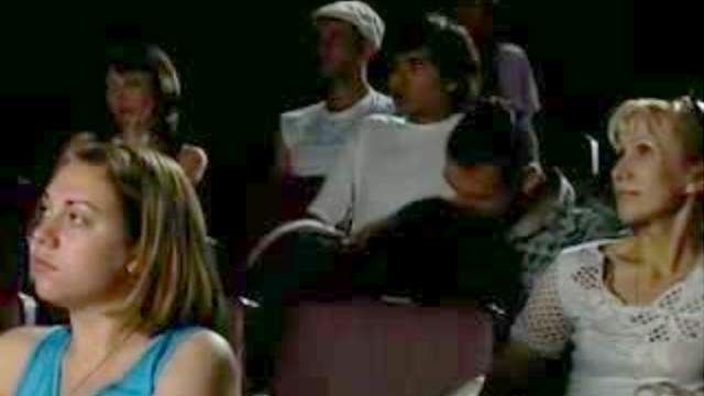 Cocksucking in a theater