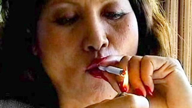 Asian smokes and makes it erotic